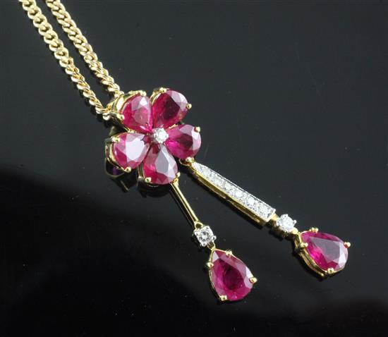 A modern 18ct gold, ruby and diamond set double drop pendant, pendant 36mm.